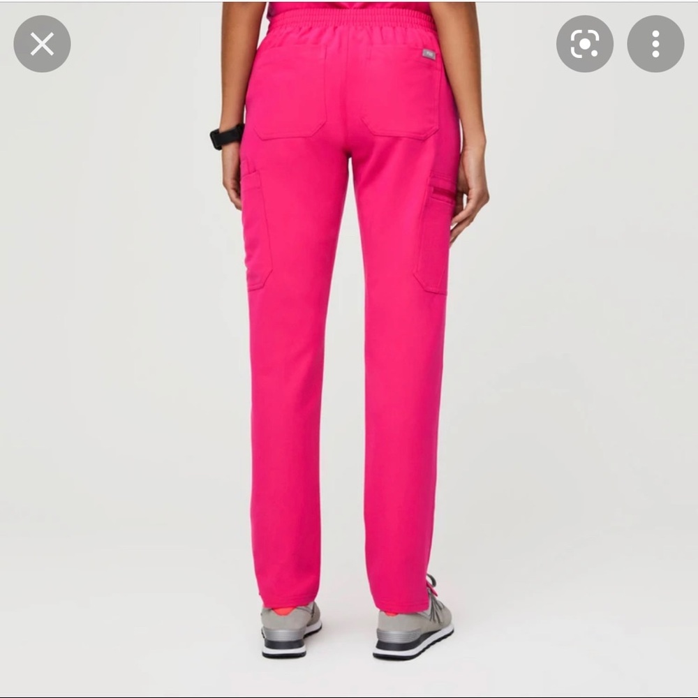 Shocking pink skinny scrub pants